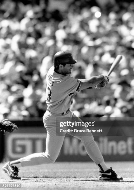 Eric Karros of the Los Angeles Dodgers swings at the pitch during an MLB game circa 1995.