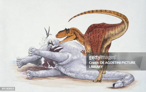 Dinosaur standing near a dead animal