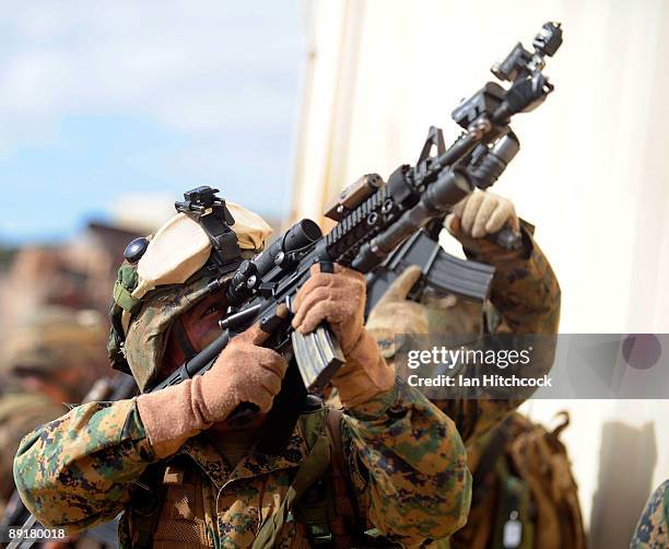 Marine from the 31st Marine Expenditionary Unit fires his rifle during the combined urban combat training exercise as part of Exercise Talisman Saber...