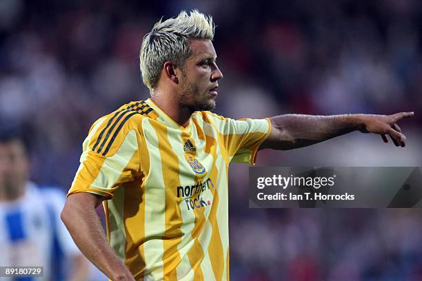 Alan Smith in action during a pre-season friendly match between Huddersfield Town and Newcastle United at the Galpharm Stadium on July 21, 2009 in...