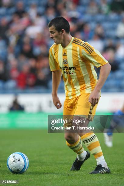 Joey Barton in action during a pre-season friendly match between Huddersfield Town and Newcastle United at the Galpharm Stadium on July 21, 2009 in...