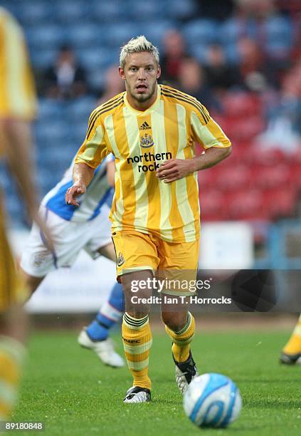 Alan Smith in action during a pre-season friendly match between Huddersfield Town and Newcastle United at the Galpharm Stadium on July 21, 2009 in...