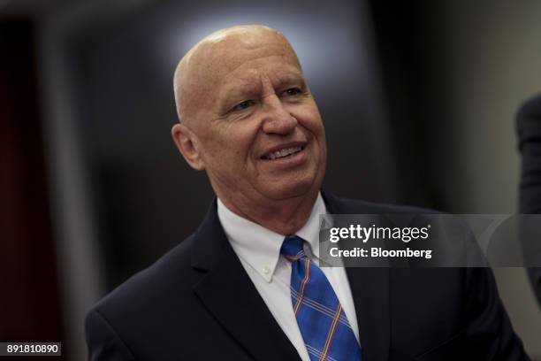 Representative Kevin Brady, a Republican from Texas and chairman of the House Ways and Means Committee, arrives to a House-Senate conference meeting...