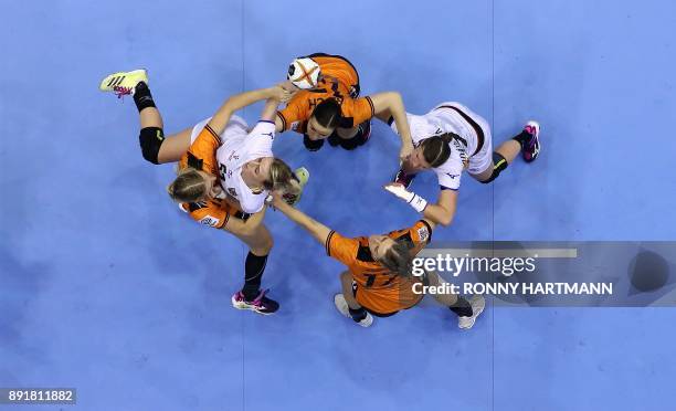 Czech Republic's Marketa Jerabkova is attacked by Netherlands' Angela Malestein , Yvette Broch and Nycke Groot, next to Czech Helena Rysankova during...