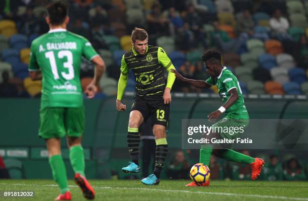 Sporting CP defender Stefan Ristovski from Macedonia with Vilaverdense FC midfielder Ahmed Isaiah in action during the Portuguese Cup match between...