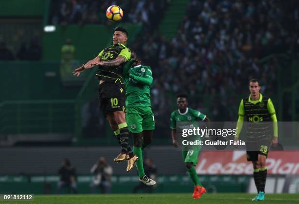 Sporting CP forward Alan Ruiz from Argentina with Vilaverdense FC midfielder Ibraima So in action during the Portuguese Cup match between Sporting CP...