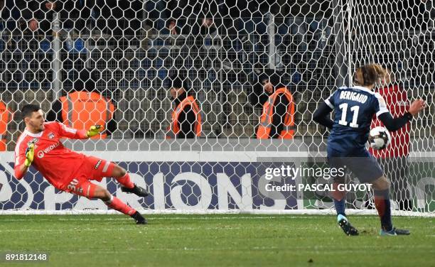 Montpellier's French forward Kevin Brigaud scores a penalty during the French League Cup round of 16 football match between Montpellier and Lyon at...