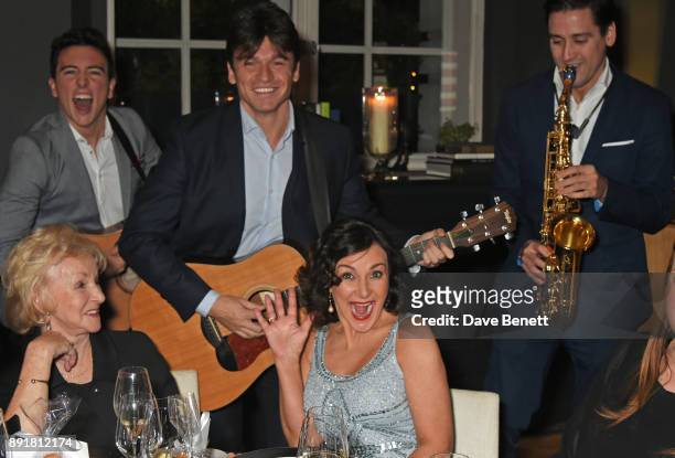 Shirley Ballas and mother Audrey Rich enjoy a performance by The Gypsy Queens at the Rosewood Mini Wishes Gala Dinner in aid of Great Ormond Street...