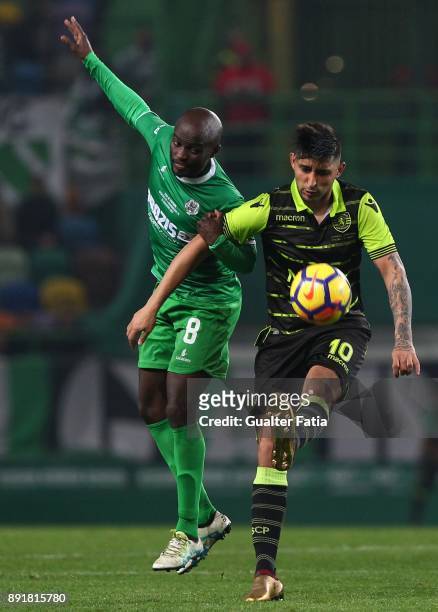 Sporting CP forward Alan Ruiz from Argentina with Vilaverdense FC midfielder Ibraima So in action during the Portuguese Cup match between Sporting CP...