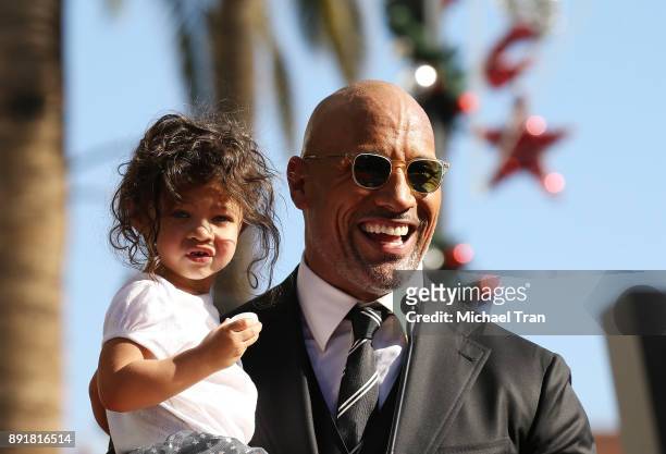 Dwayne Johnson and his daughter, Jasmine Johnson attend the ceremony honoring him with a Star on The Hollywood Walk of Fame held on December 13, 2017...
