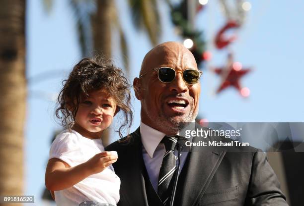 Dwayne Johnson and his daughter, Jasmine Johnson attend the ceremony honoring him with a Star on The Hollywood Walk of Fame held on December 13, 2017...