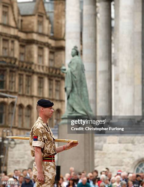 Regimental Sergeant Major Bernie Burnett, the 26th Royal Artillery Regiment stands to attention in Victoria Square on July 22, 2009 in Birmingham,...