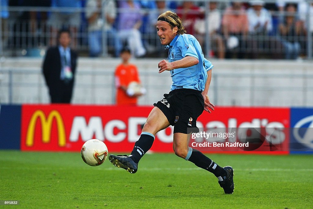 Diego Forlan Ripped Diego Forlan of Uruguay in action against Senegal as Uruguay are ...