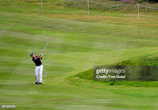 Bernard Langer takes a shot on 17th fairway during previews of the Senior Open Championship at the Sunningdale Golf Club on July 22, 2009 in...