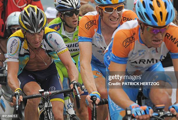 From L, Seven-time Tour de France winner and Kazakh cycling team Astana 's Lance Armstrong of the United States rides with Italian cycling team...