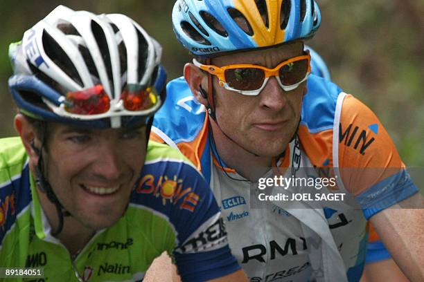 Cycling team Garmin-Slipstream 's Bradley Wiggins of Great Britain rides with Italian cycling team Liquigas 's Vincenzo Nibali of Italy on July 22,...