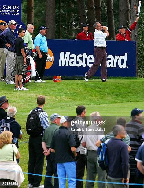 Sam Torrance tees off from the 17th hole during previews of the Senior Open Championship at the Sunningdale Golf Club on July 22, 2009 in...