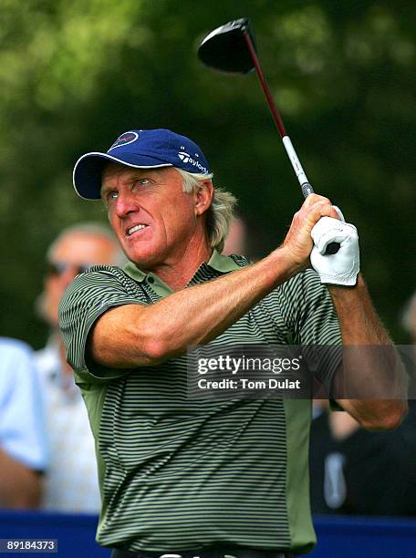 Greg Norman tees off from the 16th hole during previews of the Senior Open Championship at the Sunningdale Golf Club on July 22, 2009 in Sunningdale,...