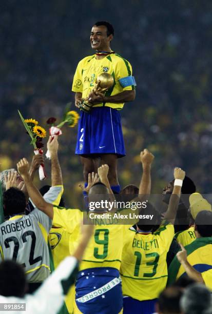 Captain Cafu of Brazil holds the trophy during the Germany v Brazil, World Cup Final match played at the International Stadium Yokohama in Yokohama,...