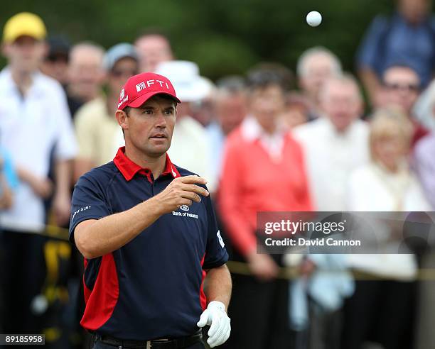 Padraig Harrington of Ireland catches his ball at the 4th hole during the Lough Erne Challenge, on the Faldo Course at the Lough Erne Hotel and Golf...