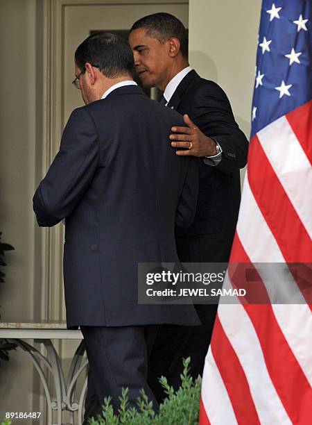 President Barack Obama shows Iraqi Prime Minister Nuri al-Maliki the way after giving a joint press conference following their meeting at the Rose...