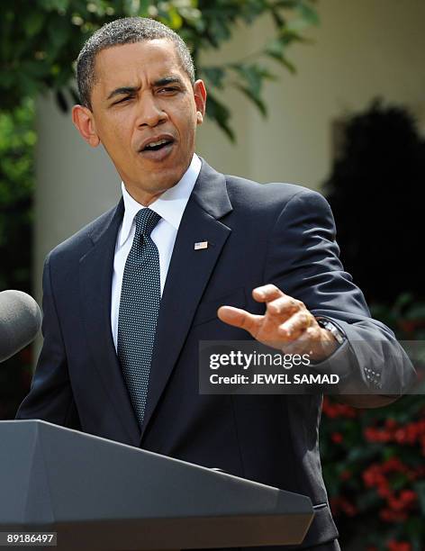 President Barack Obama answers a questioin during a joint press conference with Iraqi Prime Minister Nuri al-Maliki following their meeting at the...