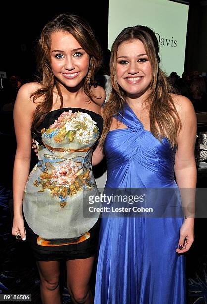 Singers Miley Cyrus and Kelly Clarkson attend the 2009 GRAMMY Salute To Industry Icons honoring Clive Davis at the Beverly Hilton Hotel on February...