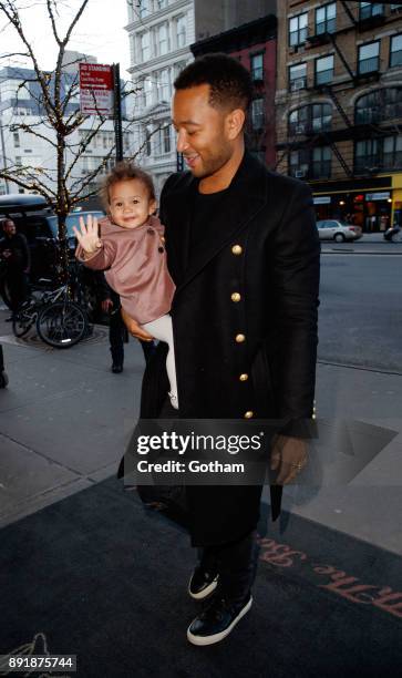 John Legend and daughter Luna are seen on December 13, 2017 in New York City.