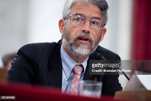 Director of the White House Office of Science and Technology John Holdren testifies at a hearing on Capitol Hill July 22, 2009 in Washington, DC. The...