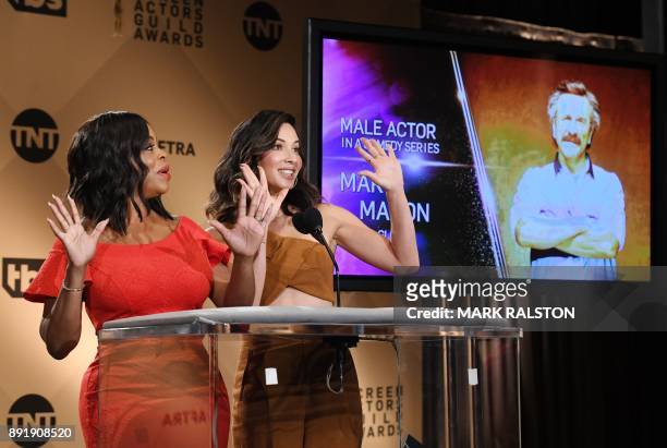 Presenters Niecy Nash and Olivia Munn on stage during the 24th Annual Screen Actors Guild Awards Nominations Announcement at the Pacific Design...
