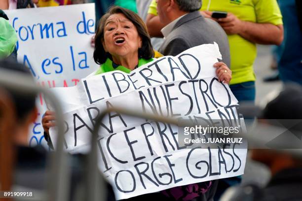 Supporters of Ecuador's vice president Jorge Glas demonstrate outside the National Court of Justice during the sentencing hearing, in Quito, Ecuador,...