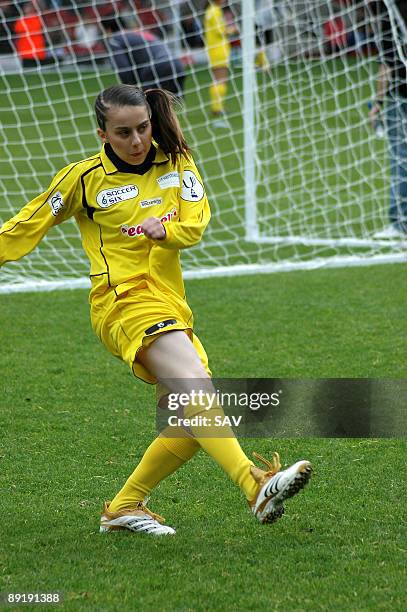 Lady Sovereign tries a shot on goal