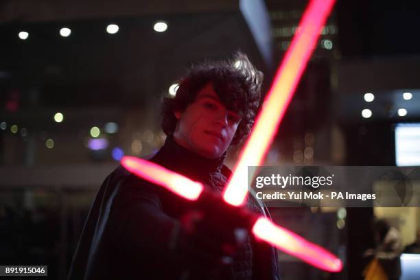 Anthony Dome from London, dressed as Kylo Ren, arrives for a screening of Star Wars: The Last Jedi at Leicester Square in London.