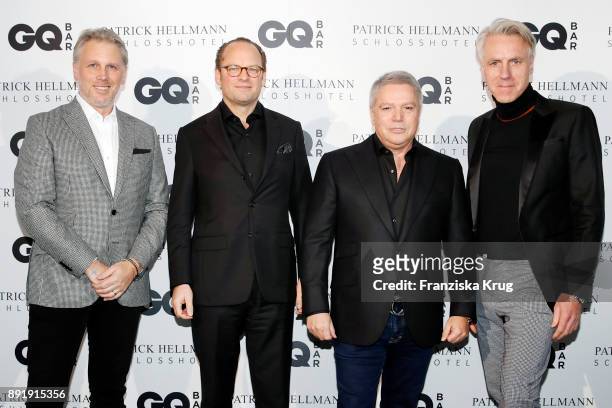 Gary Robinson, Moritz von Laffert, Patrick Hellmann and Tom Junkersdorf attend the GQ Bar opening at Patrick Hellmann Schlosshotel on December 13,...