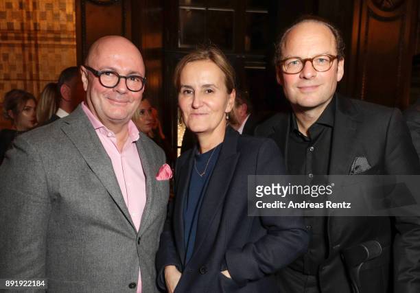 Andre Maeder, Petra Fladenhofer and Moritz von Laffert attend the GQ Bar opening at Patrick Hellmann Schlosshotel on December 13, 2017 in Berlin,...