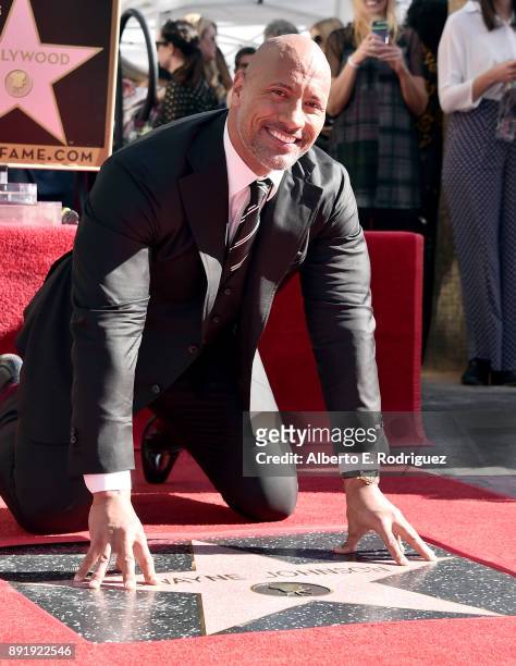 Actor Dwayne Johnson attends a ceremony honoring him with the 2,624th star on the Hollywood Walk of Fame on December 13, 2017 in Hollywood,...