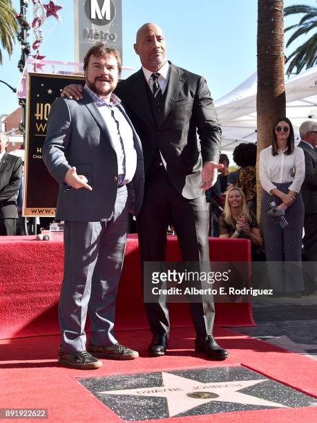 Actors Jack Black and Dwayne Johnson attend a ceremony honoring Dwayne Johnson with the 2,624th star on the Hollywood Walk of Fame on December 13,...