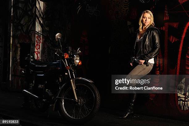 Racing driver Amber Anderson poses for a portrait session in a Melbourne CBD laneway on July 23, 2009 in Melbourne, Australia.