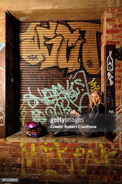 Racing driver Amber Anderson poses for a portrait session in a Melbourne CBD laneway on July 23, 2009 in Melbourne, Australia.