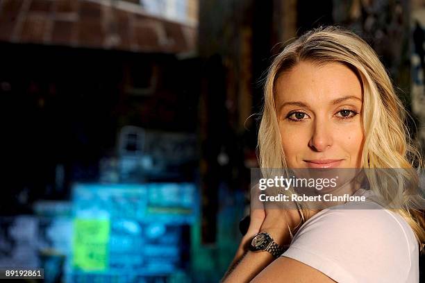 Racing driver Amber Anderson poses for a portrait session in a Melbourne CBD laneway on July 23, 2009 in Melbourne, Australia.