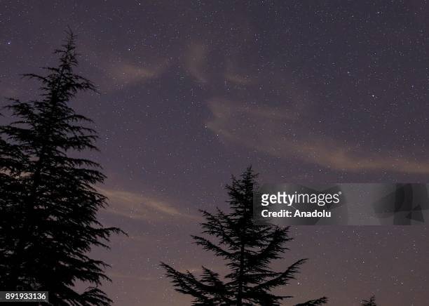 Meteors named as 'Geminid' streak across the sky over Turkey's Ankara on December 14, 2017.