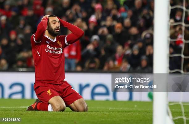 Mohamed Salah of Liverpool reacts after a near miss during the Premier League match between Liverpool and West Bromwich Albion at Anfield on December...