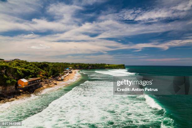 balangan beach at sunset. bali, indonesia. - uluwatu stock pictures, royalty-free photos & images