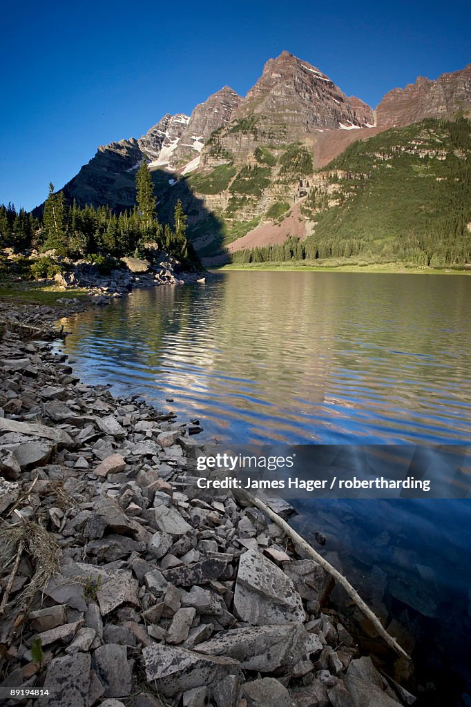 Maroon Bells and Crater Lake at dawn, Maroon Bells-Snowmass Wilderness, Gunnison National Forest, Colorado, United States of America, North America