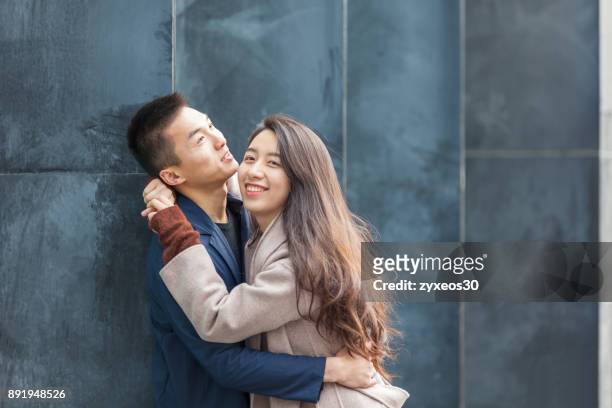 a young lover hugged,shanghai,china - east asia, - china east asia stock-fotos und bilder