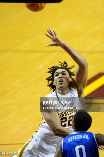 Reggie Lynch of the Minnesota Golden Gophers shoots the ball against the Drake Bulldogs during the game on December 11, 2017 at Williams Arena in...