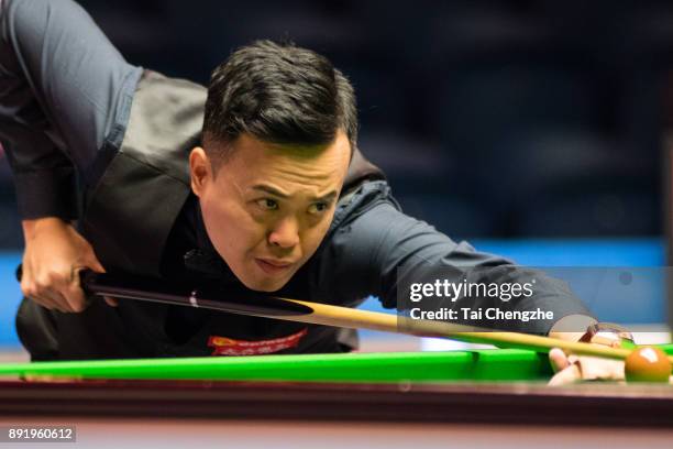 Marco Fu of Chinese Hong Kong plays a shot during his second round match against Fang Xiongman of China on day three of the 2017 Scottish Open at...