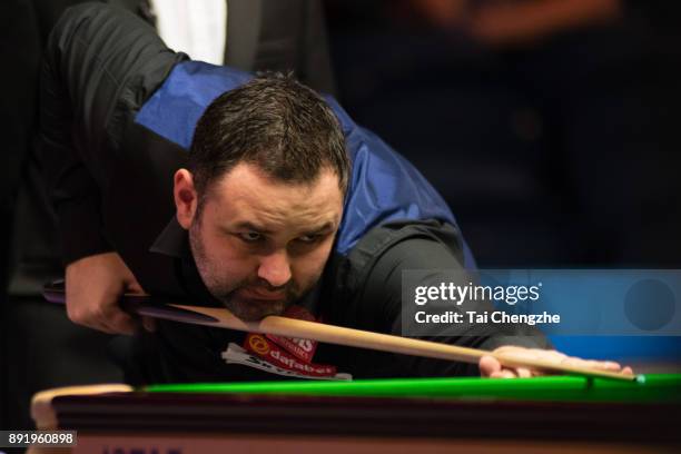 Stephen Maguire of Scotland plays a shot during his second round match against Hamza Akbar of Pakistan on day three of the 2017 Scottish Open at...