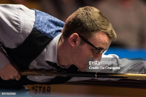 Sam Craigie of England plays a shot during his second round match against Judd Trump of England on day three of the 2017 Scottish Open at Emirates...