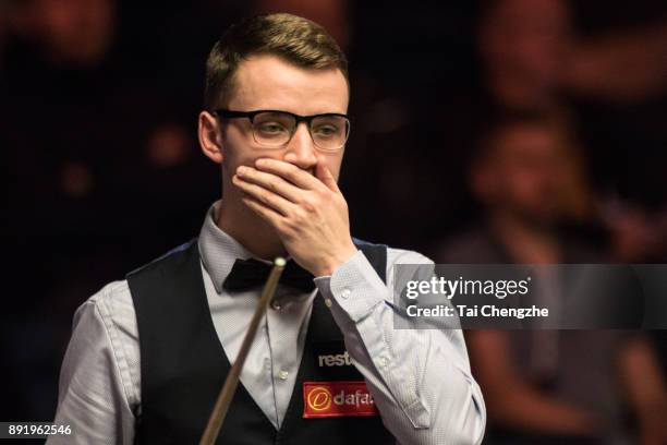 Sam Craigie of England reacts during his second round match against Judd Trump of England on day three of the 2017 Scottish Open at Emirates Arena on...